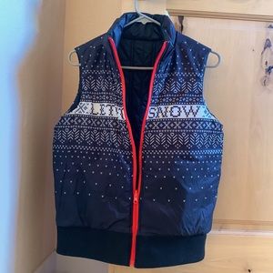 Reversible “Let it Snow” Krimson Klover down alternative puffy vest.